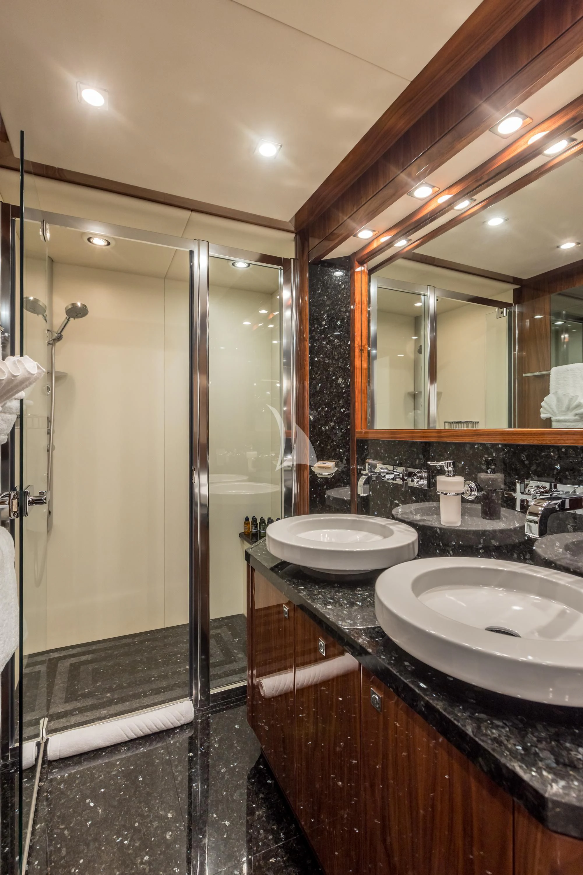 a bathroom with a glass shower aboard KATARIINA I Yacht for Sale