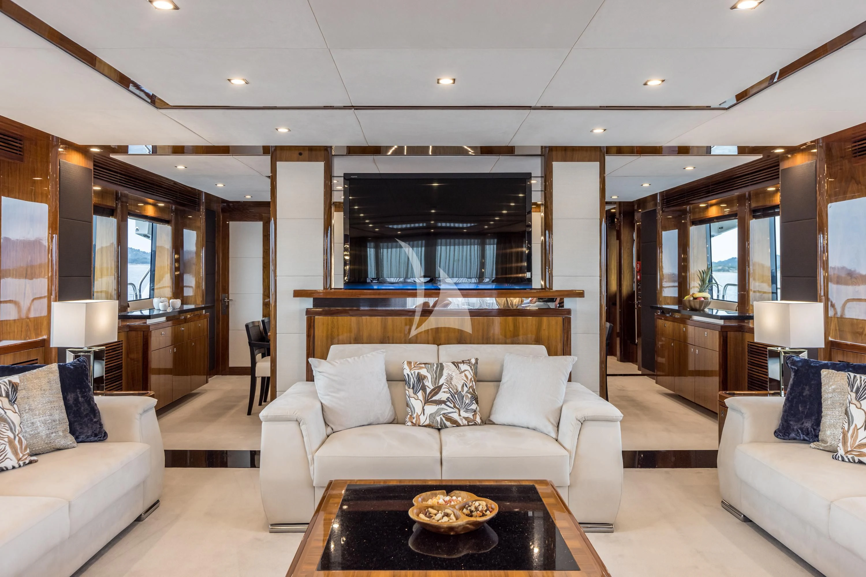 a living room with a large fireplace aboard KATARIINA I Yacht for Sale