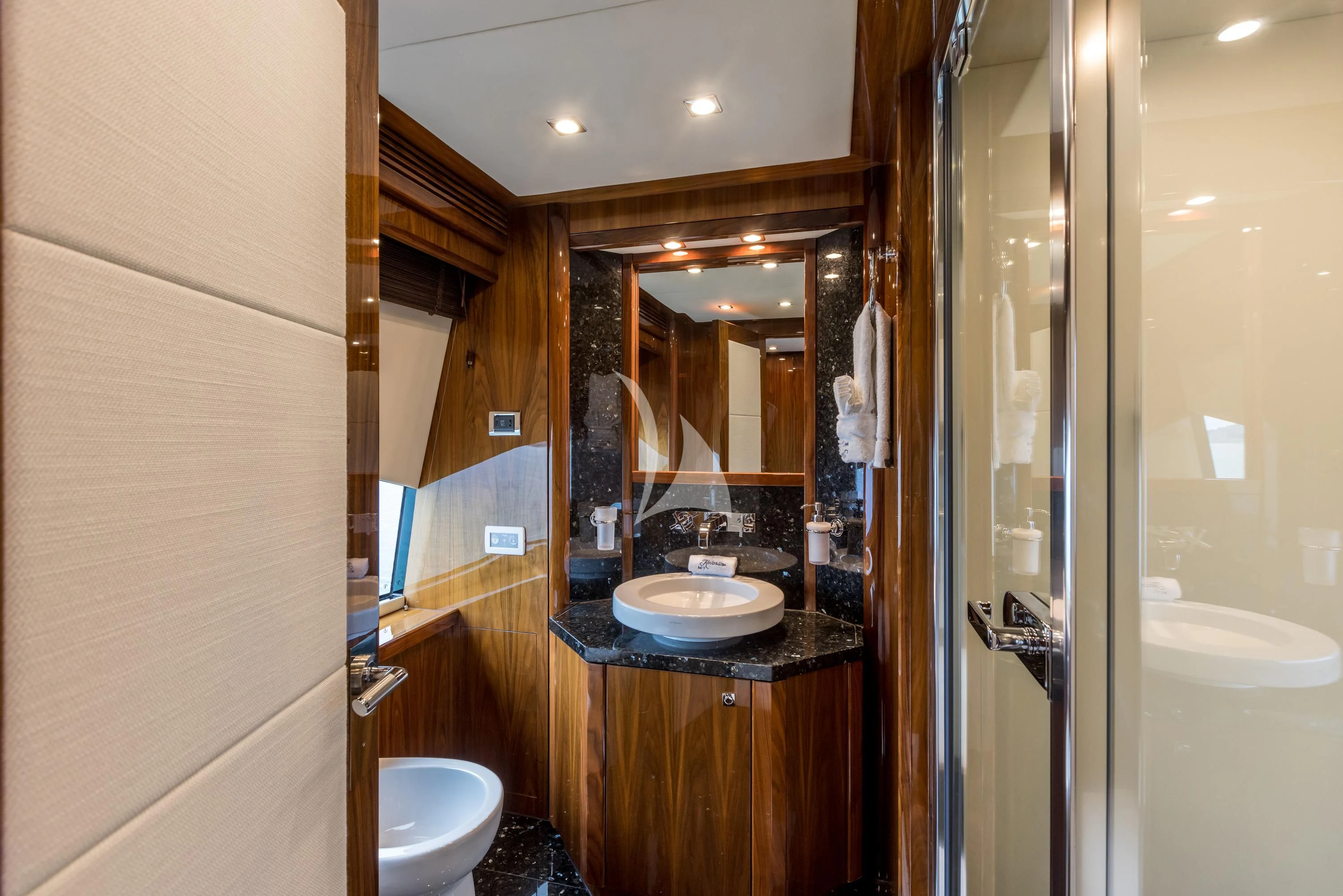 a bathroom with a sink and a mirror aboard KATARIINA I Yacht for Sale