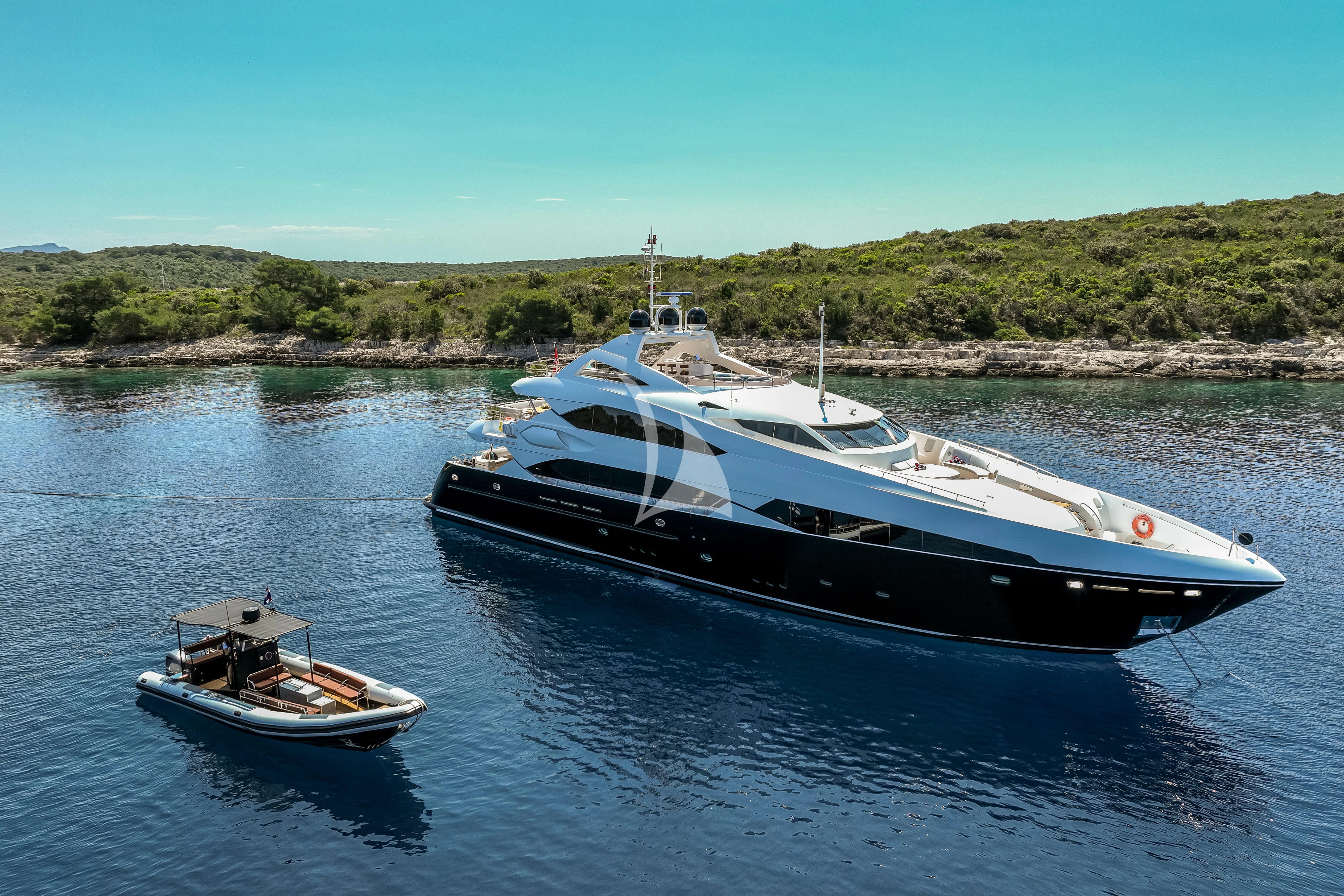 a couple of boats sit in the water aboard KATARIINA I Yacht for Sale