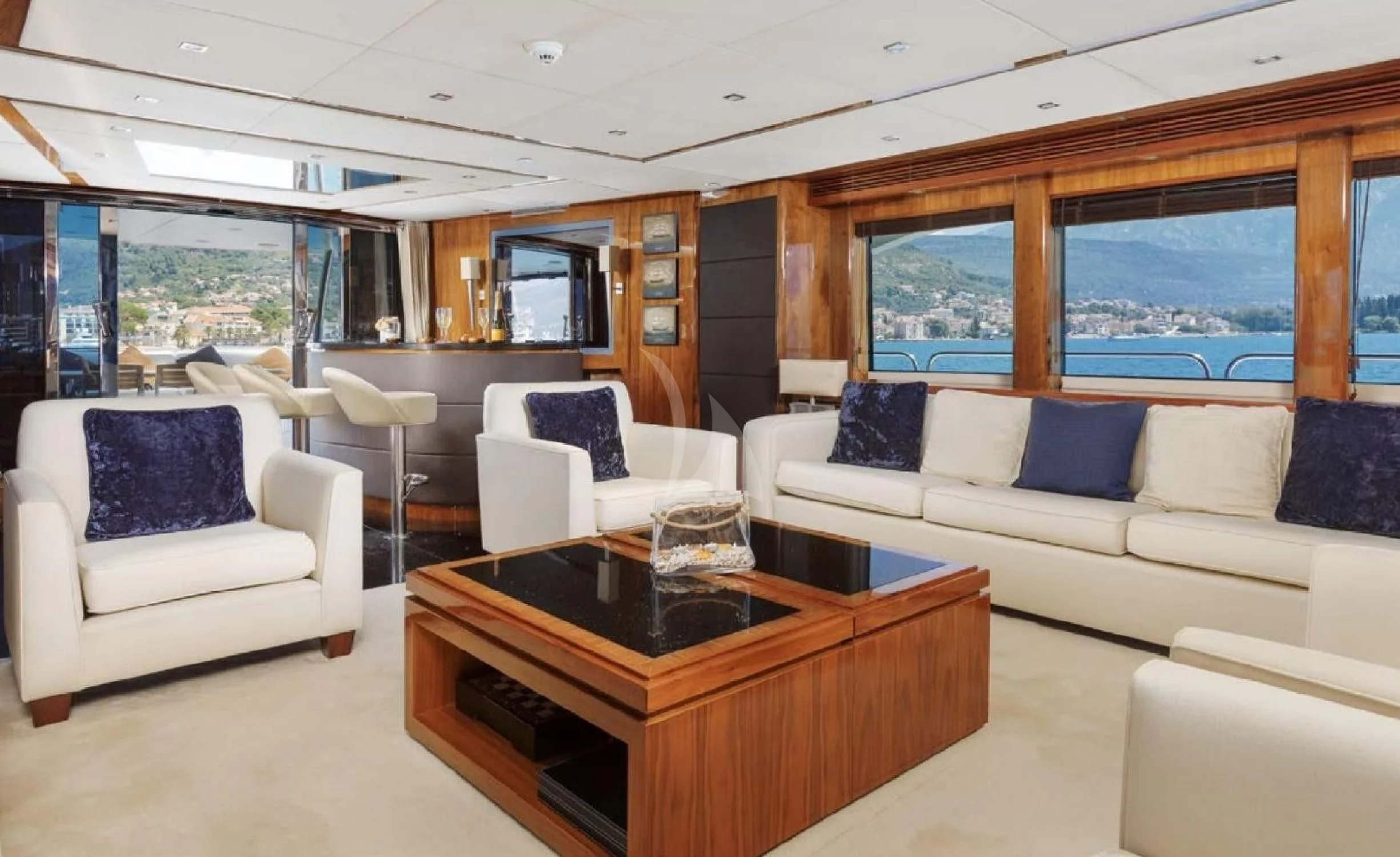 a living room with a large window aboard KATARIINA I Yacht for Sale