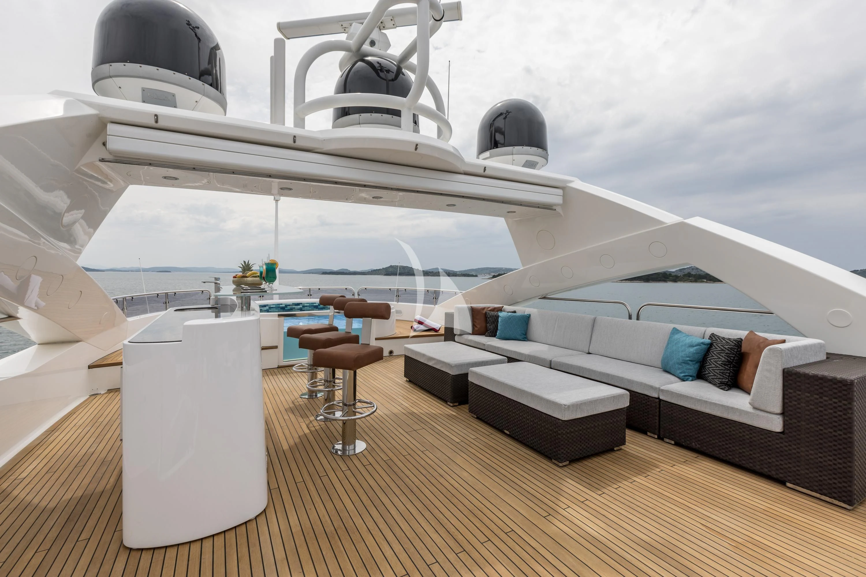 a room with a couch and a table and a large satellite dish aboard KATARIINA I Yacht for Sale