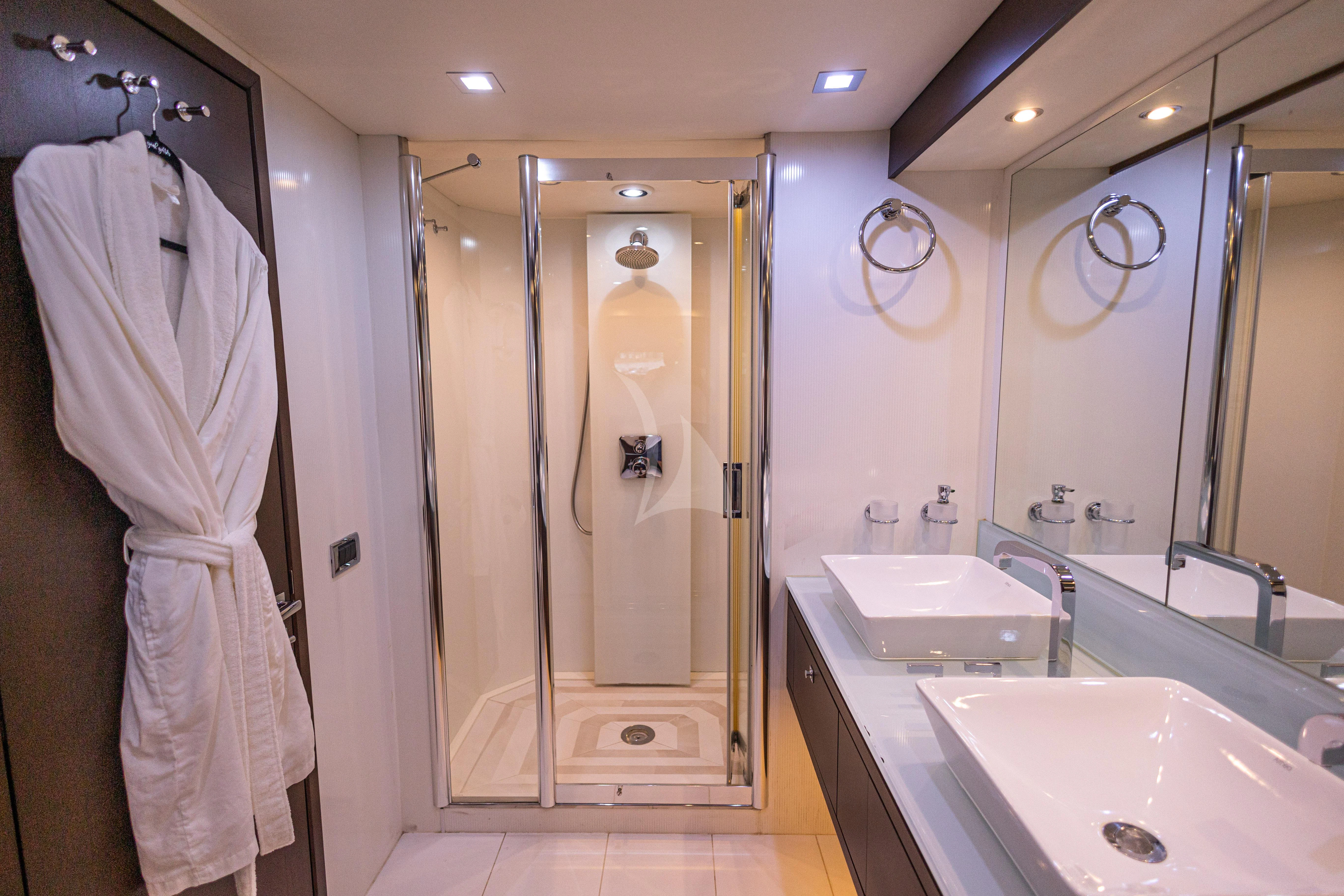 a bathroom with a sink and a shower aboard MOZZ II Yacht for Sale