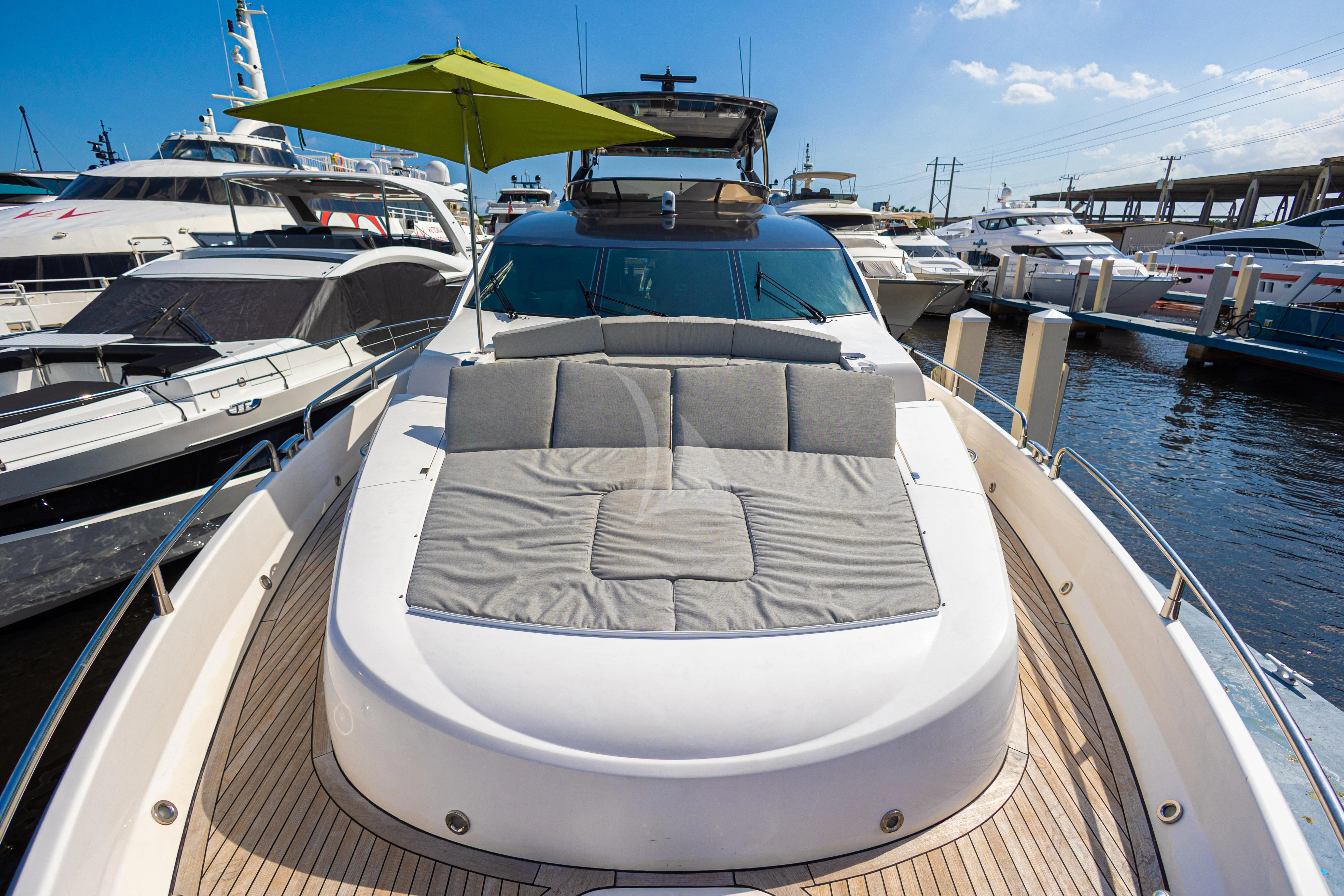 a boat docked at a pier aboard MOZZ II Yacht for Sale