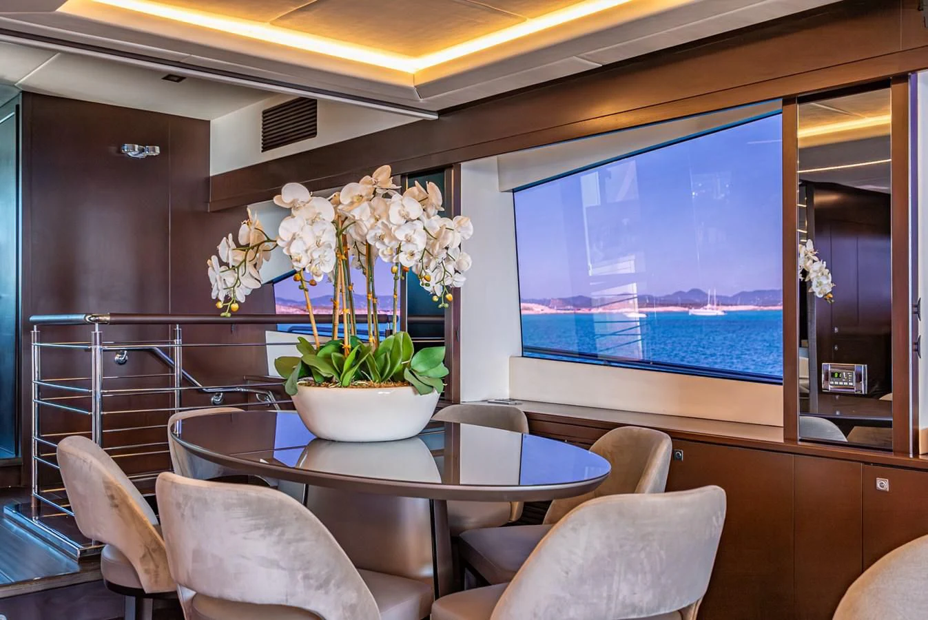 a potted plant on a table aboard MOZZ II Yacht for Sale