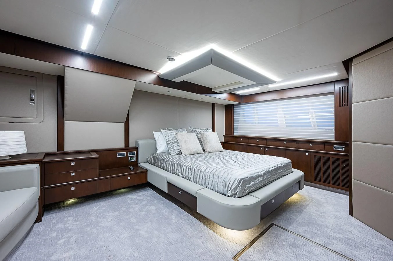 a room with a bed and a desk aboard MOZZ II Yacht for Sale