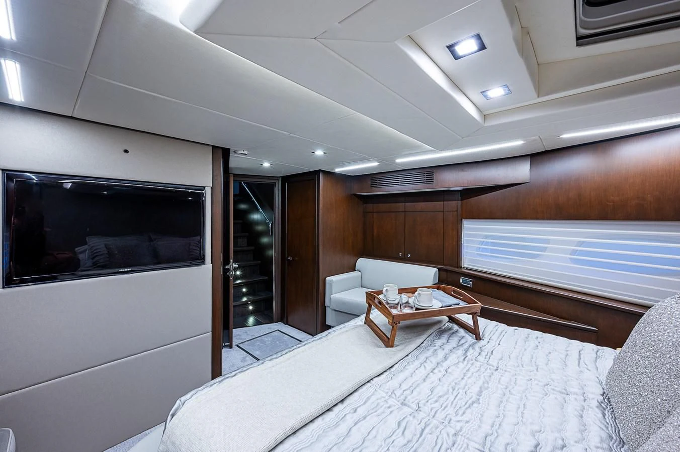 a room with a couch and a television aboard MOZZ II Yacht for Sale
