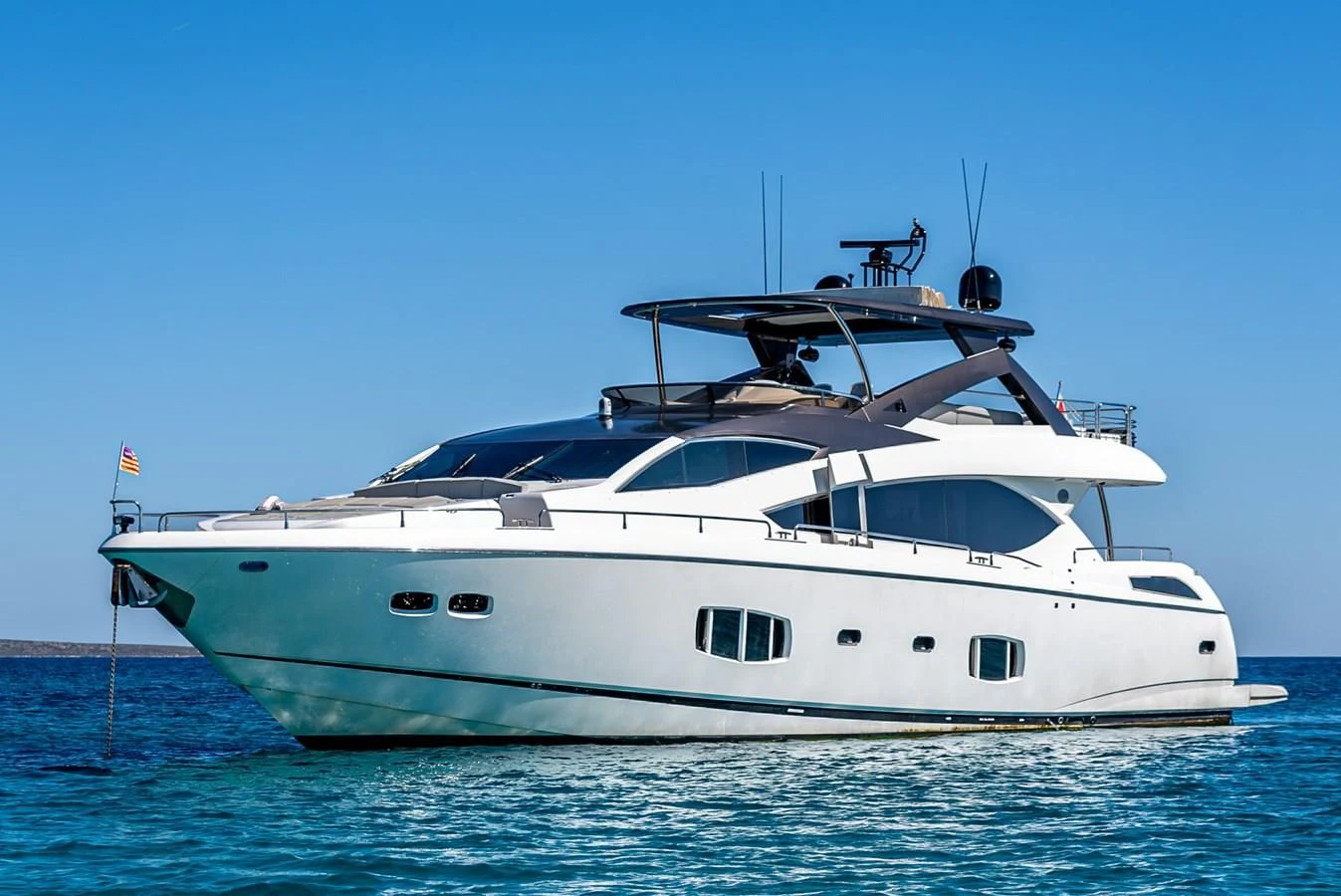 a white yacht in the water aboard MOZZ II Yacht for Sale