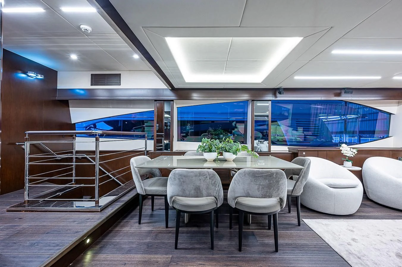 a room with a table chairs and a large window aboard MOZZ II Yacht for Sale