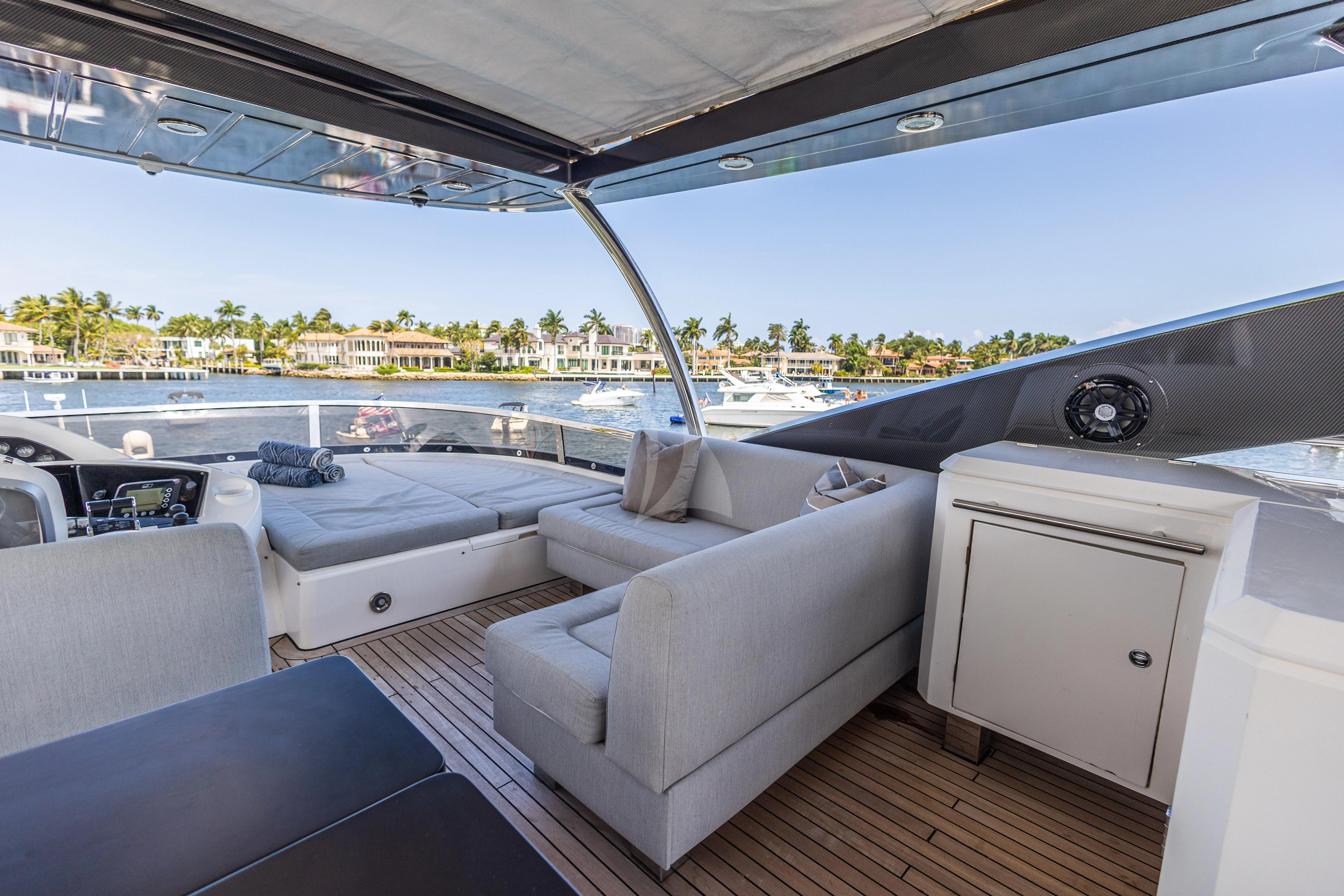 a white car parked in a room aboard MOZZ II Yacht for Sale