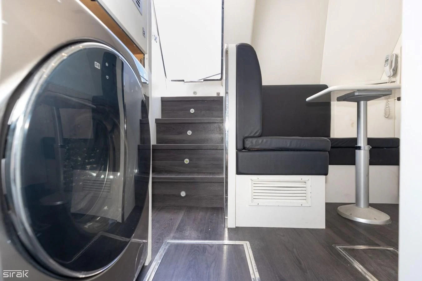 a chair and a desk in a room aboard MOZZ II Yacht for Sale