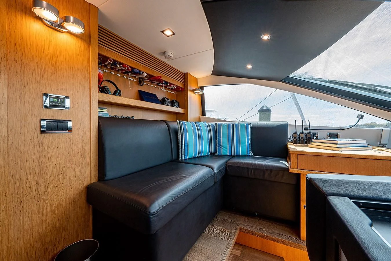 a couch in a room aboard MOZZ II Yacht for Sale