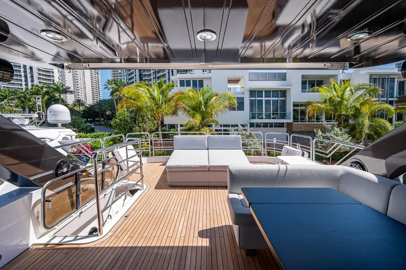 a room with a deck and a pool aboard MOZZ II Yacht for Sale