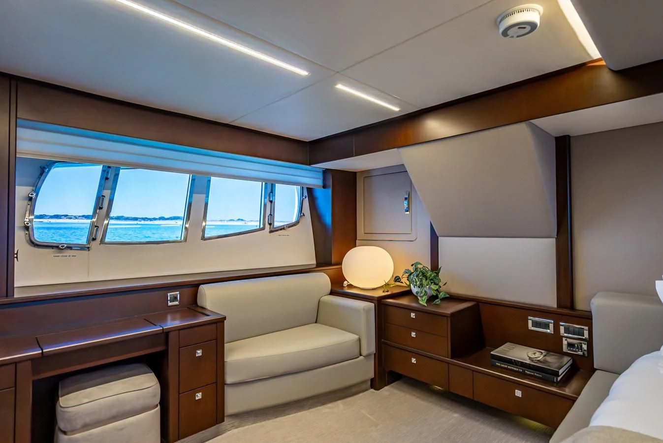 a room with a desk and a bed aboard MOZZ II Yacht for Sale