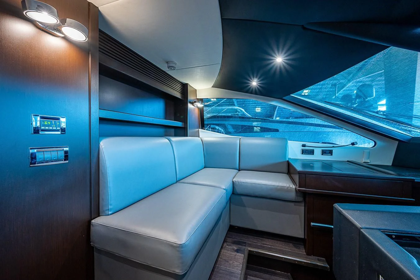 a vehicle with a seat and a desk in the back aboard MOZZ II Yacht for Sale