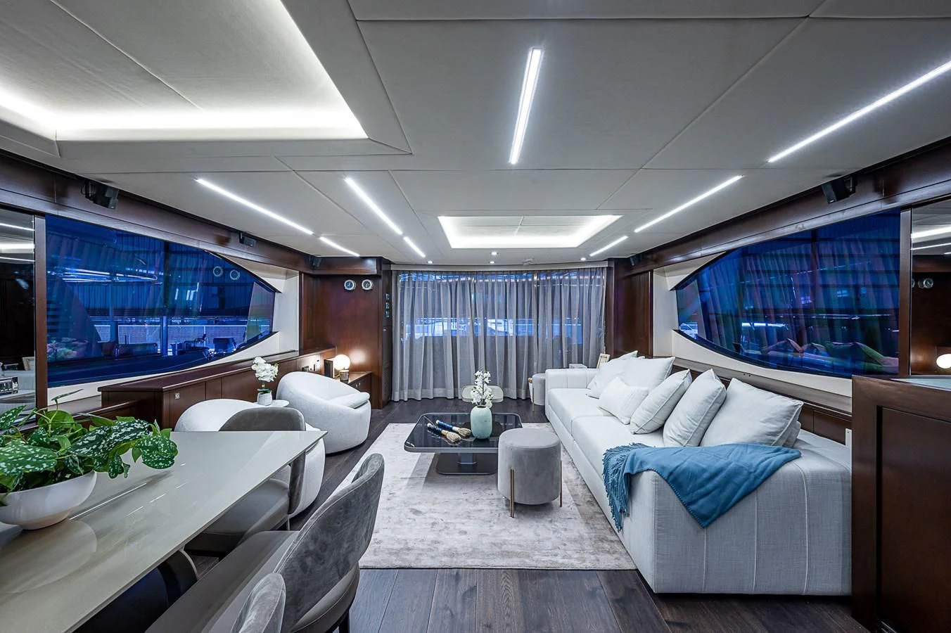 a room with a couch and a table aboard MOZZ II Yacht for Sale