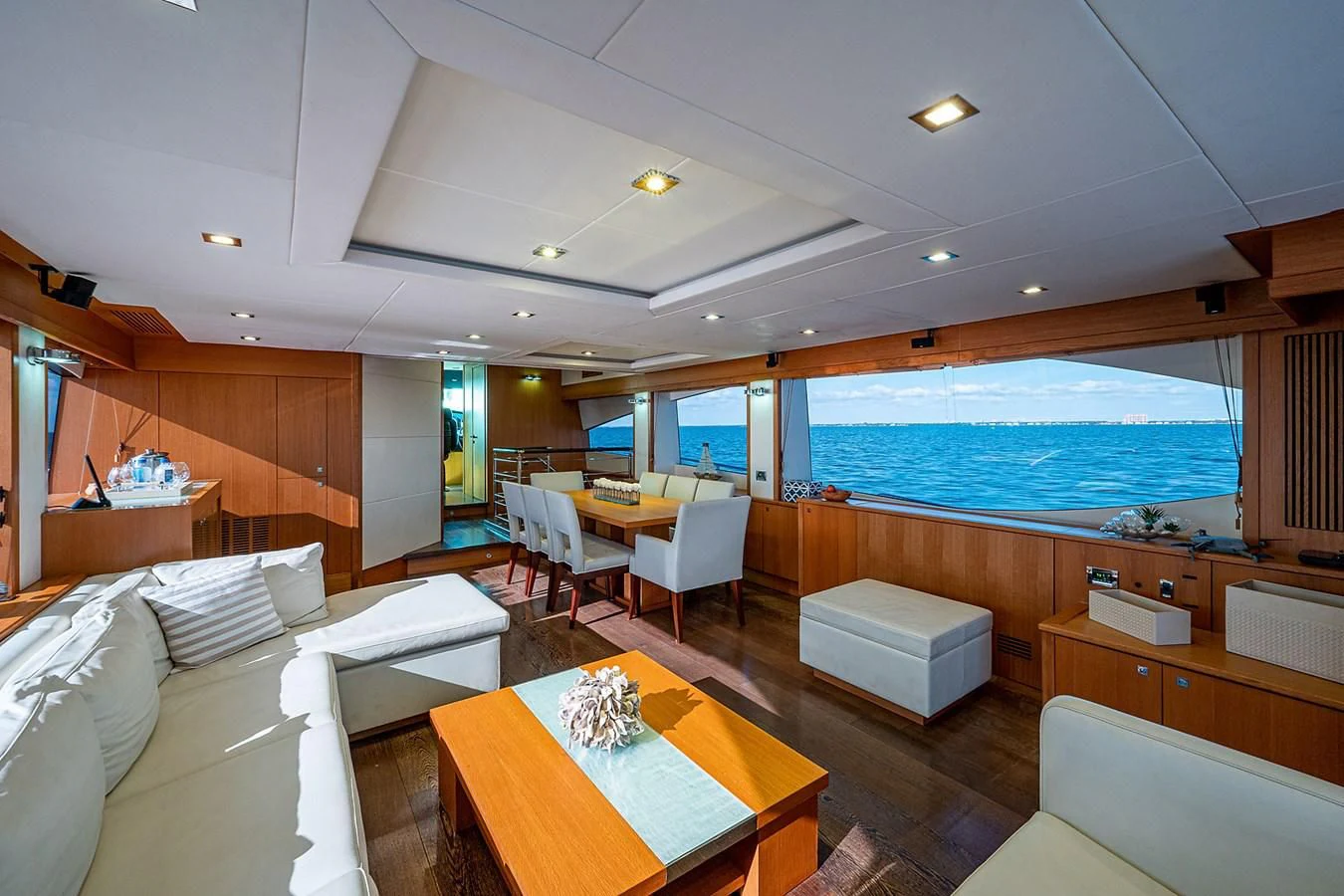 a living room with a large pool aboard MOZZ II Yacht for Sale