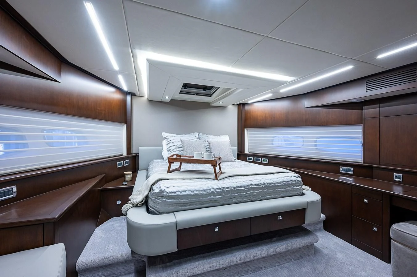a room with a bed and a desk aboard MOZZ II Yacht for Sale