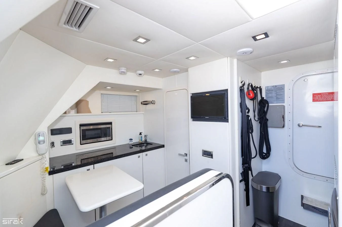 a room with a sink and a microwave aboard MOZZ II Yacht for Sale