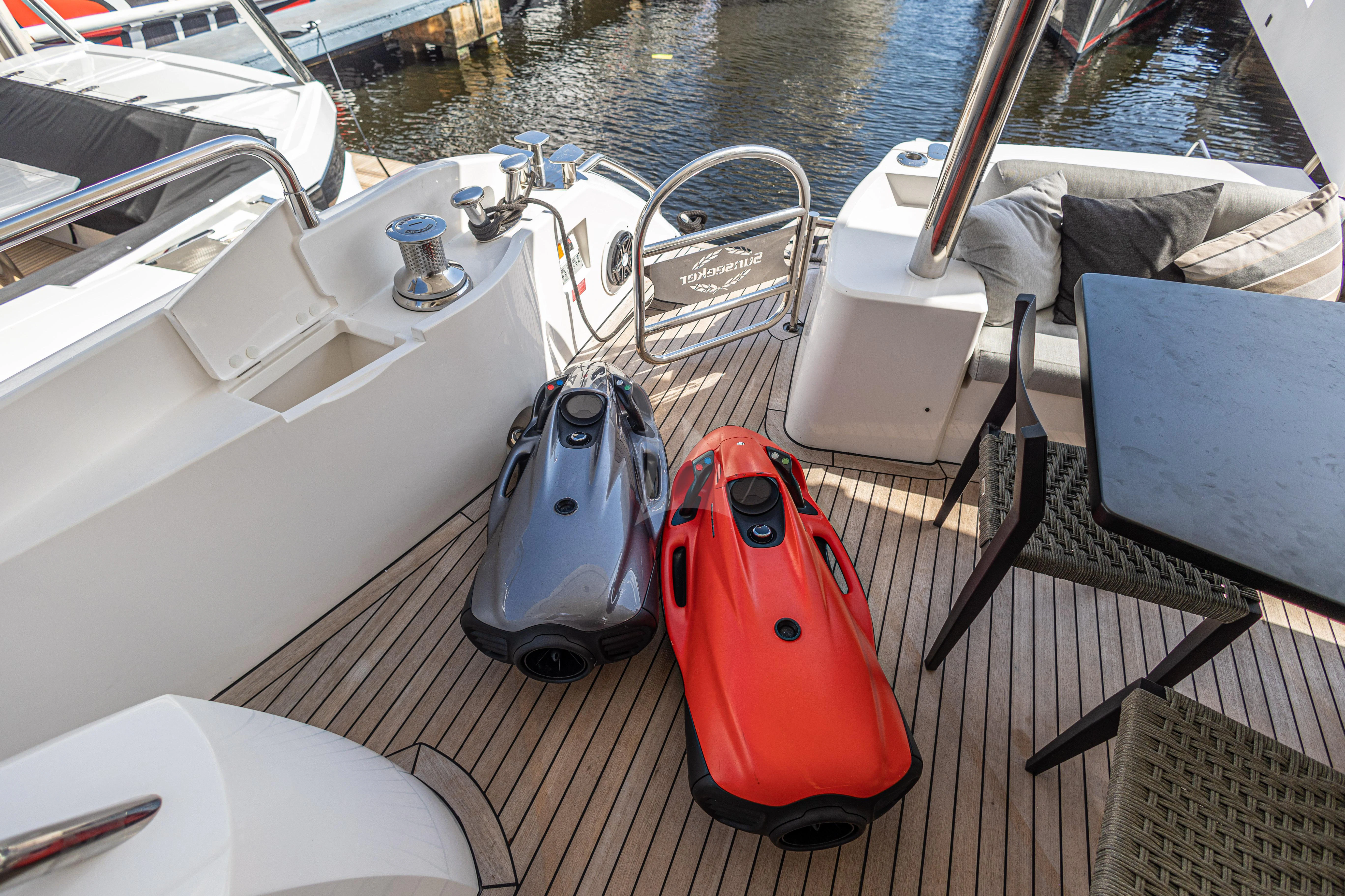 a boat with a red seat aboard MOZZ II Yacht for Sale