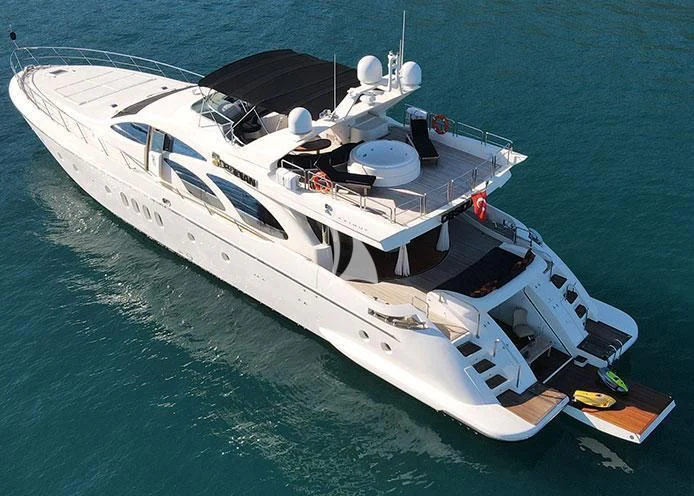 a white boat on the water aboard OBSIDIAN Yacht for Sale