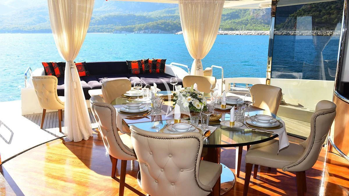 a table set for a dinner aboard OBSIDIAN Yacht for Sale