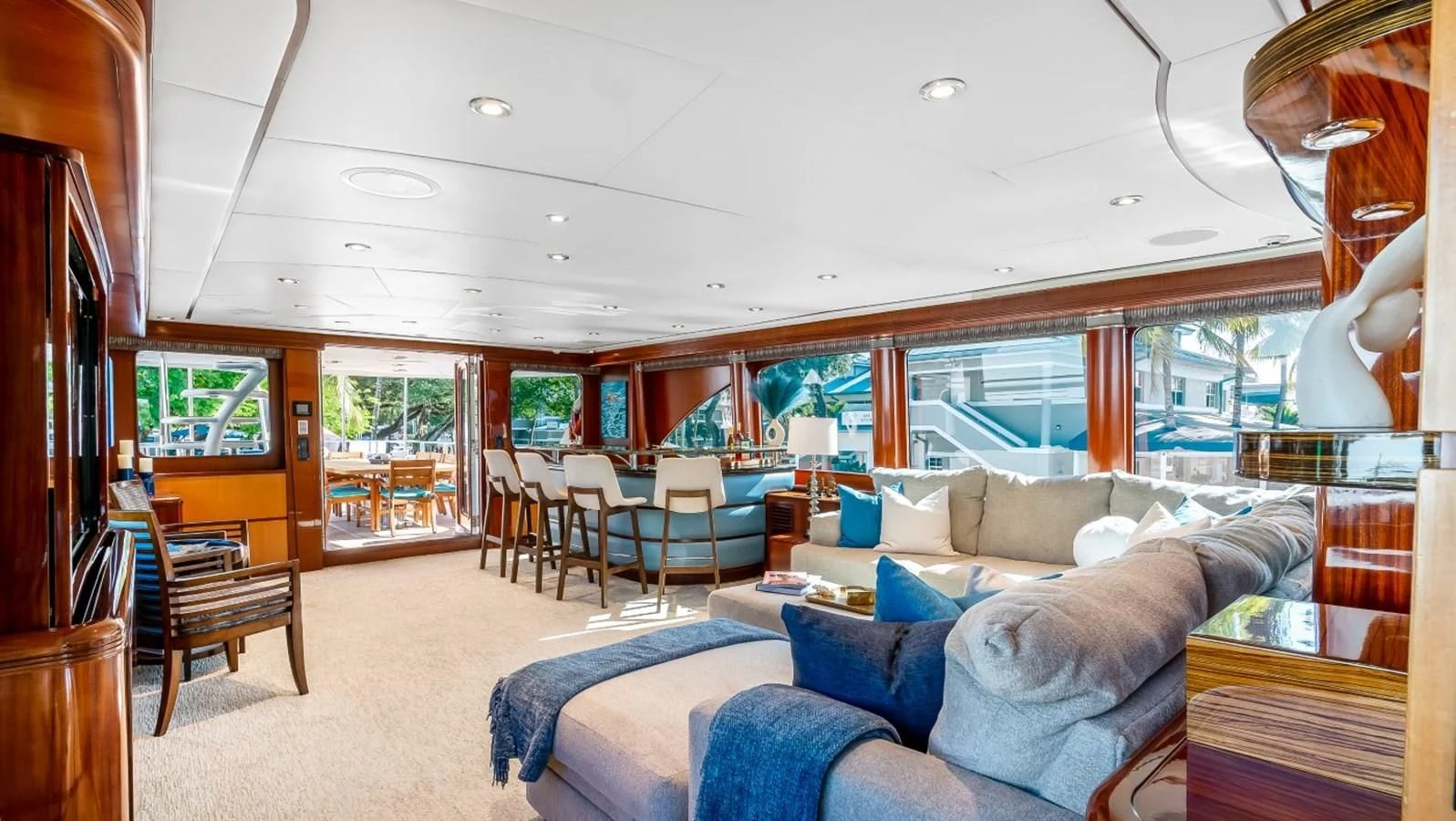 a living room with a large window aboard JUST ENOUGH Yacht for Charter