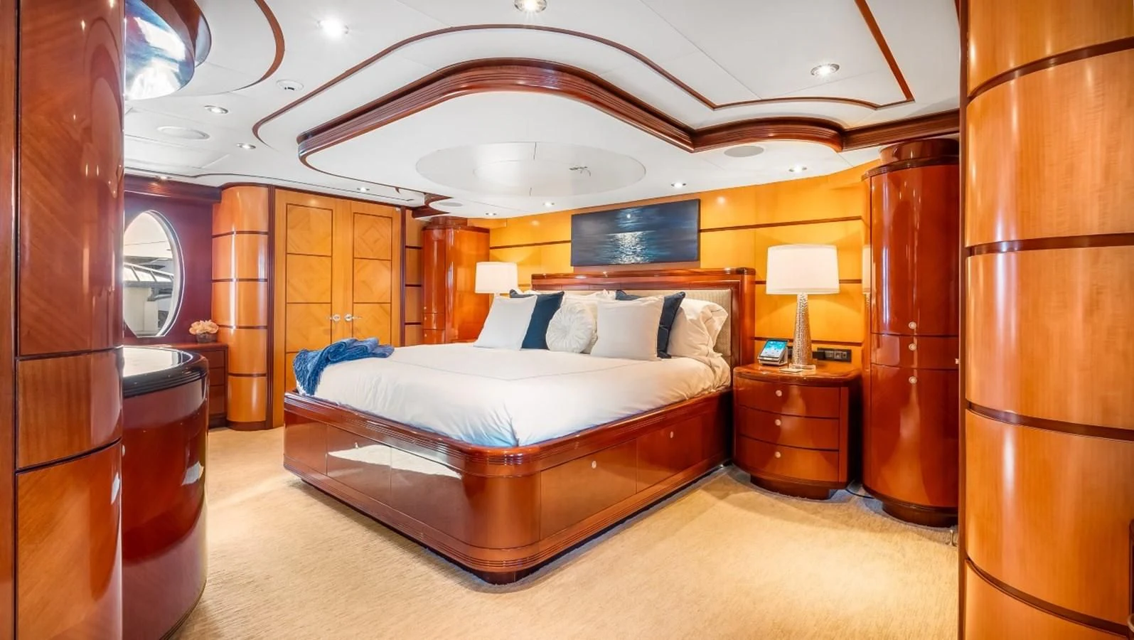 a large bed in a room aboard JUST ENOUGH Yacht for Charter
