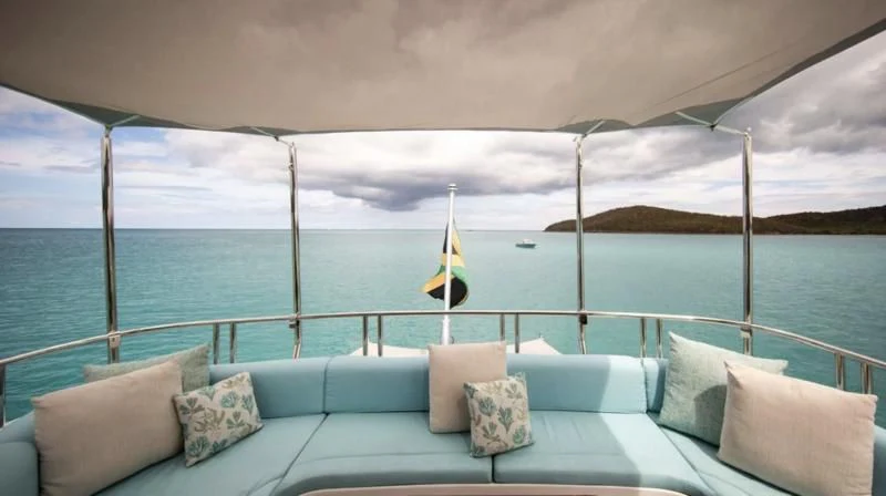 a boat on a body of water aboard JUST ENOUGH Yacht for Charter