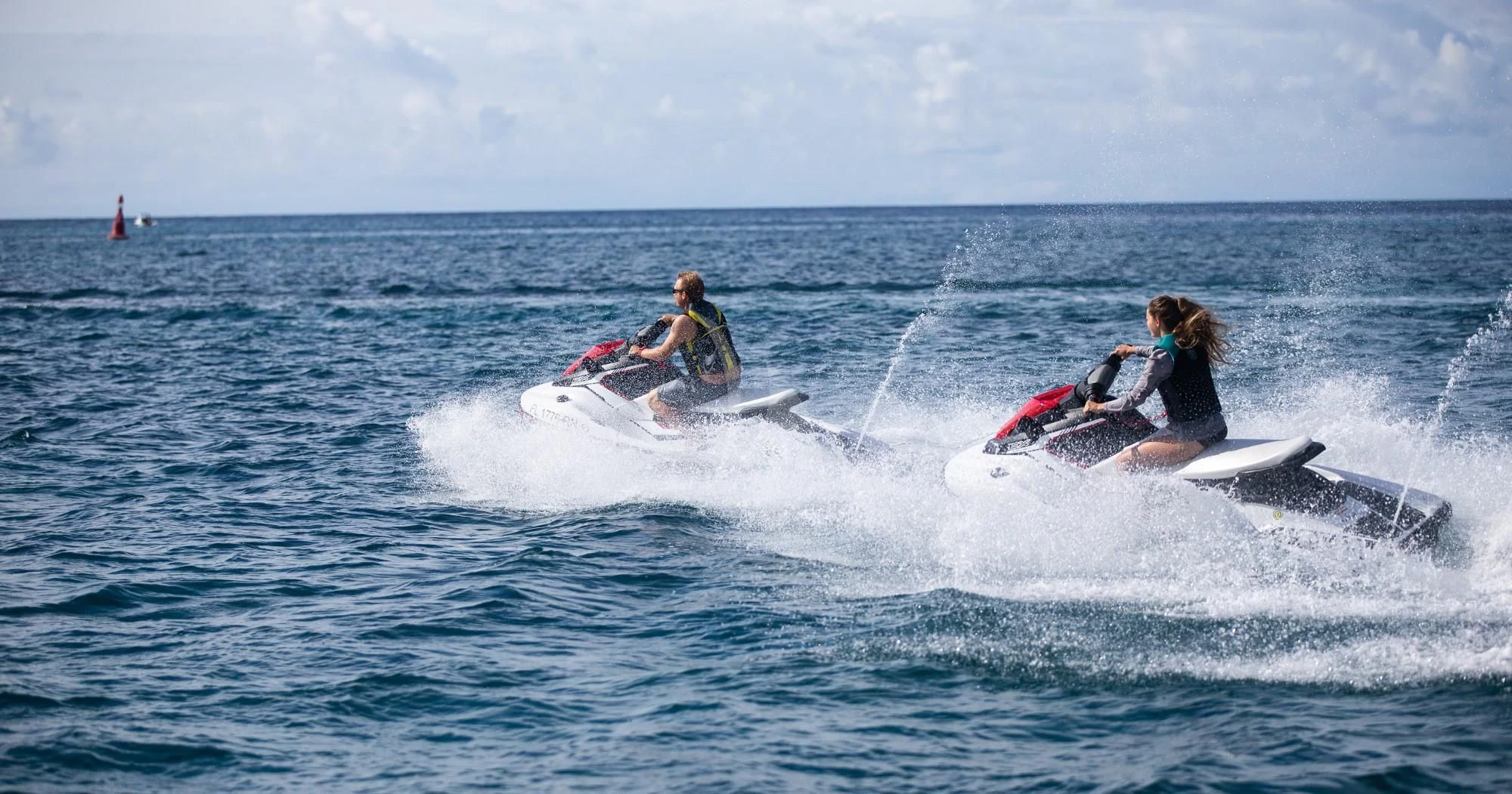 a group of people riding surfboards aboard JUST ENOUGH Yacht for Charter