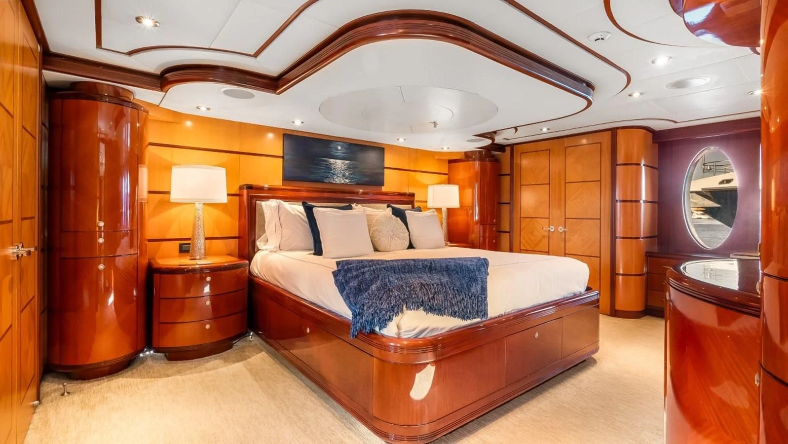 a bedroom with a large bed aboard JUST ENOUGH Yacht for Charter