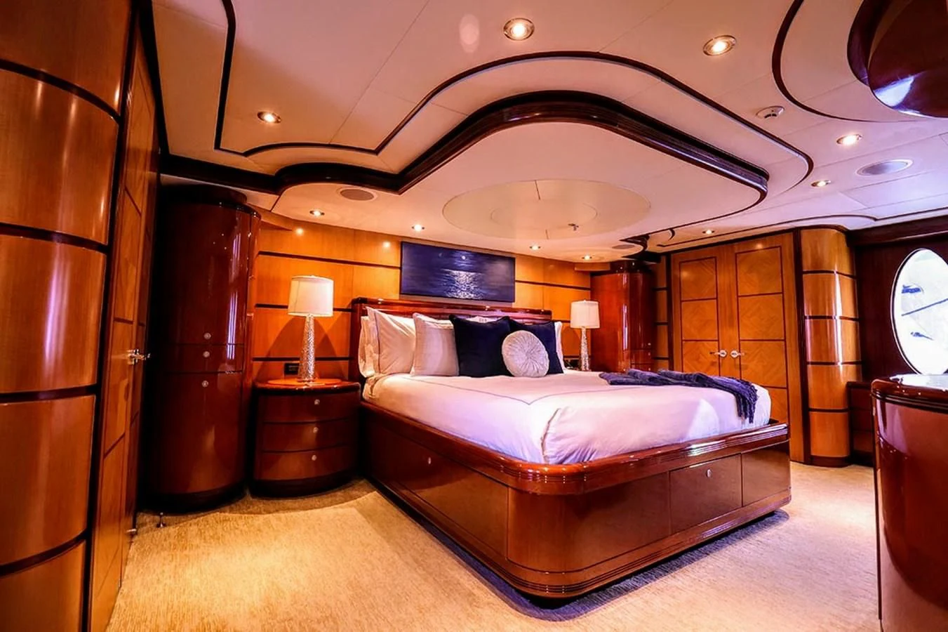a large bedroom with a large bed aboard JUST ENOUGH Yacht for Charter