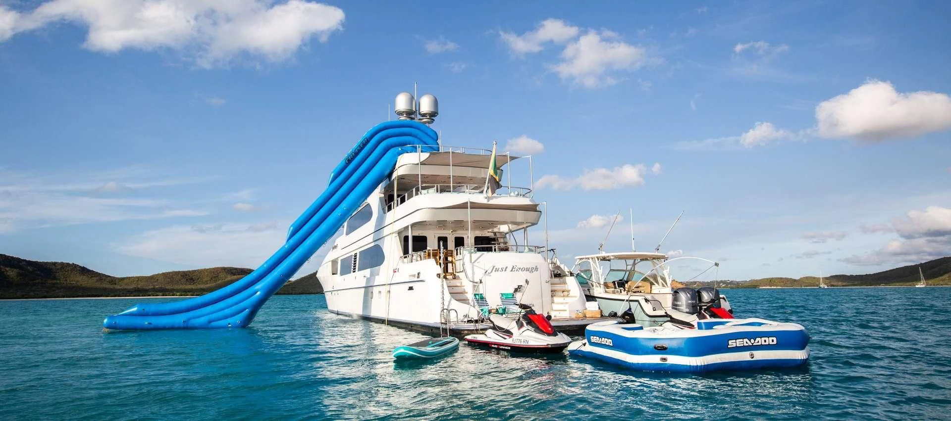 a couple of boats on the water aboard JUST ENOUGH Yacht for Charter