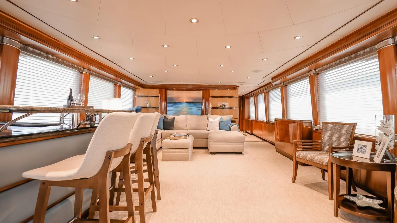a living room with a large window aboard JUST ENOUGH Yacht for Charter