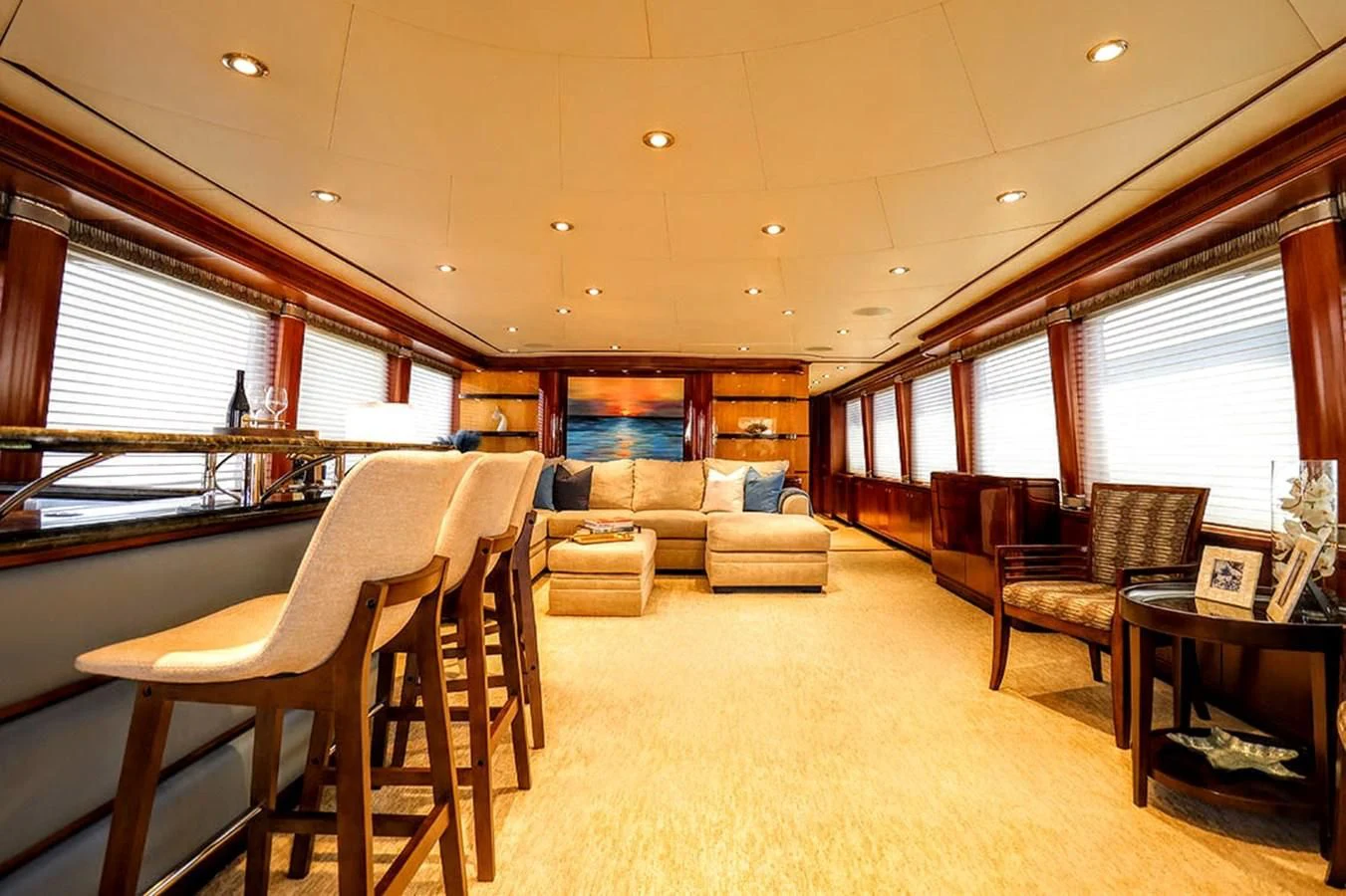 a living room with a table and chairs aboard JUST ENOUGH Yacht for Charter