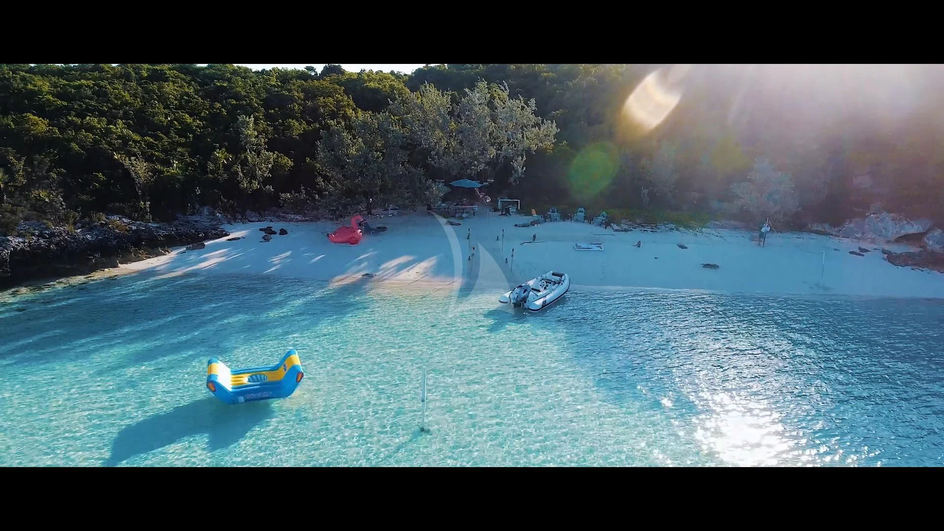 boats on a beach aboard JUST ENOUGH Yacht for Charter