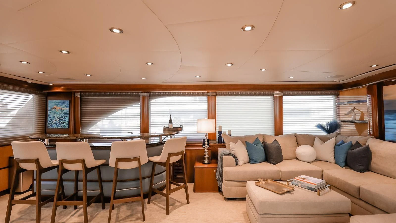 a living room with a couch and a table aboard JUST ENOUGH Yacht for Charter