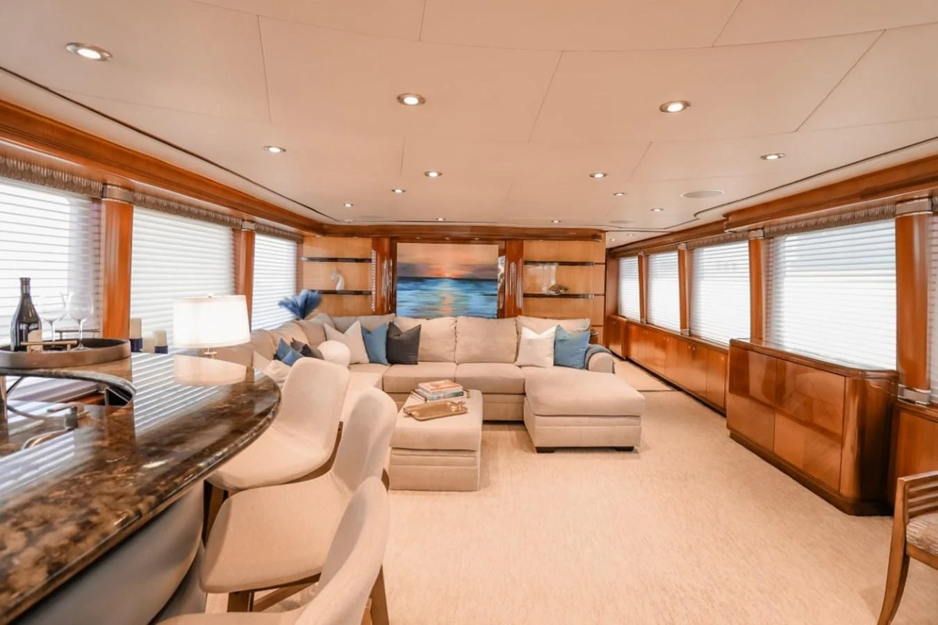 a living room with a large window aboard JUST ENOUGH Yacht for Charter
