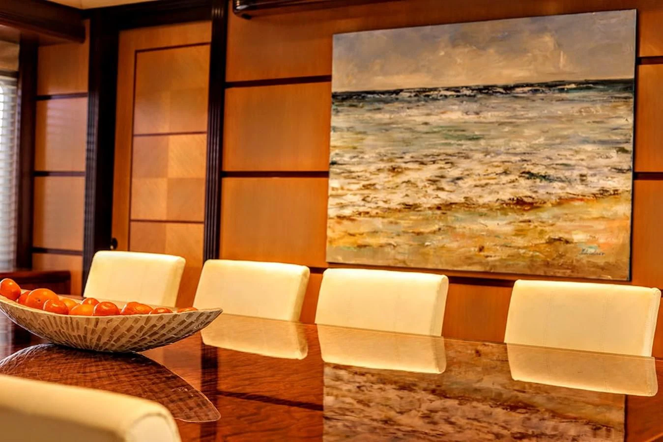 a room with a table and chairs aboard JUST ENOUGH Yacht for Charter