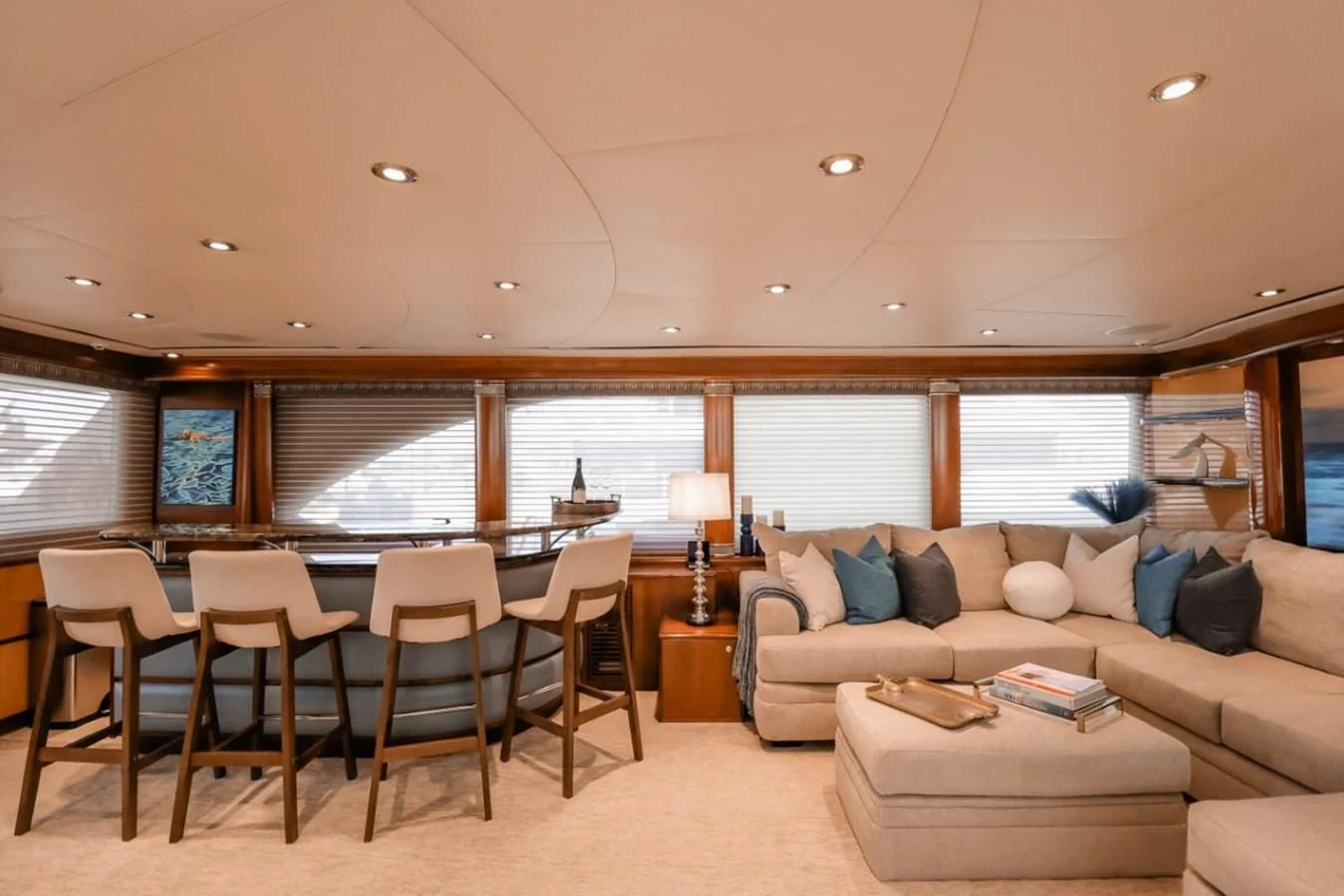 a living room with a couch and a table aboard JUST ENOUGH Yacht for Charter