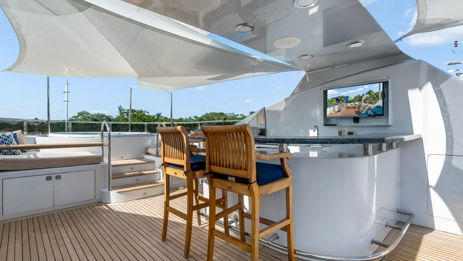a room with a table and chairs aboard JUST ENOUGH Yacht for Charter