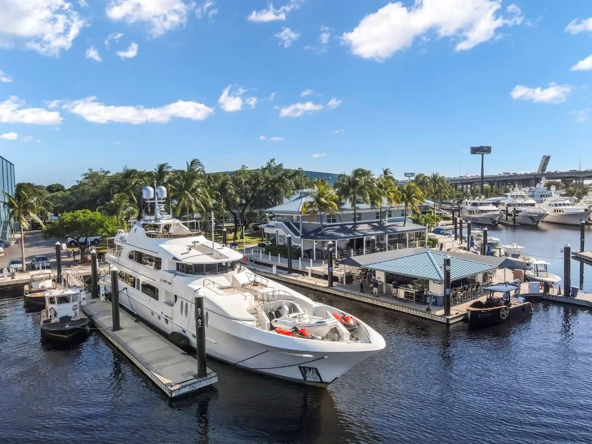 a marina with boats and a dock aboard JUST ENOUGH Yacht for Charter