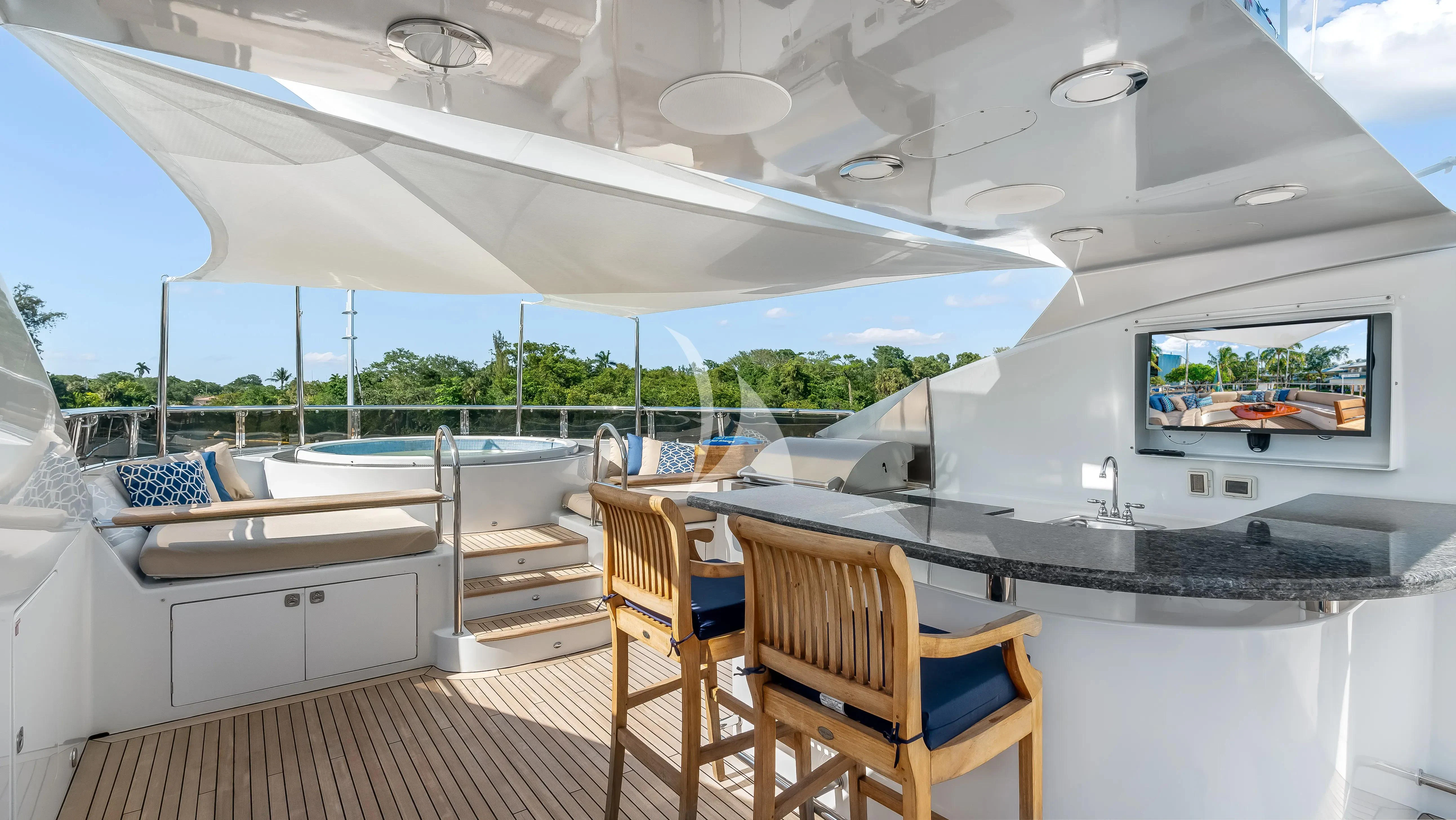 a room with a table and chairs aboard JUST ENOUGH Yacht for Charter