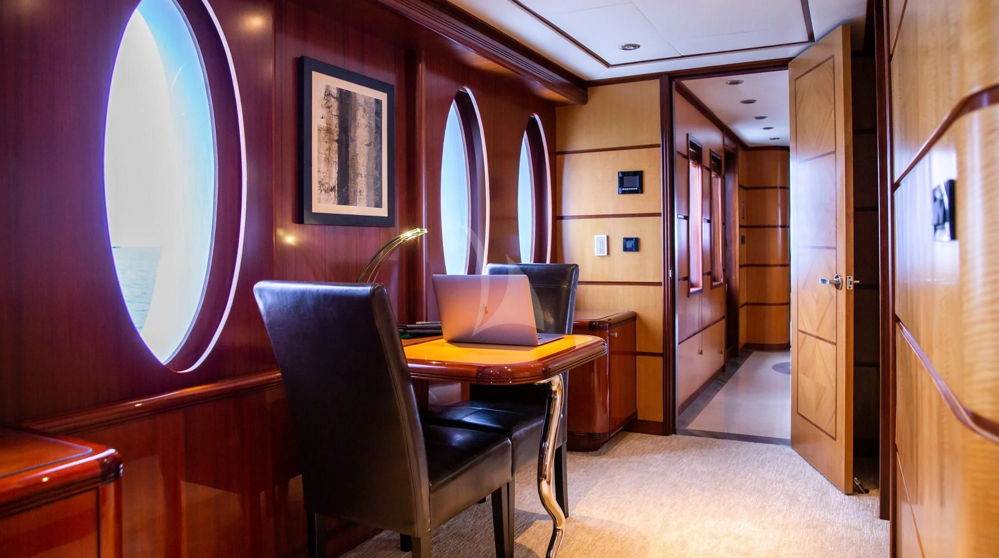 a room with a table and chairs aboard JUST ENOUGH Yacht for Charter