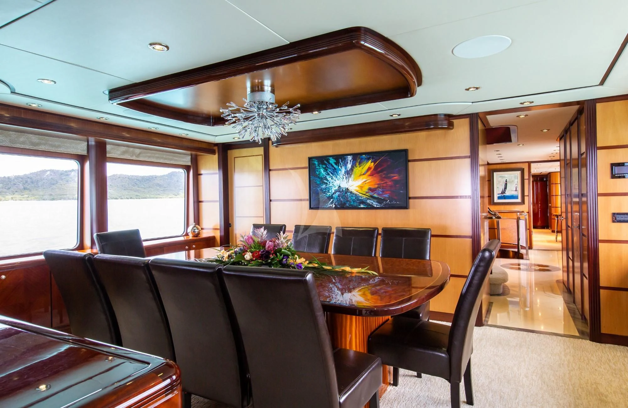 a room with a table and chairs aboard JUST ENOUGH Yacht for Charter