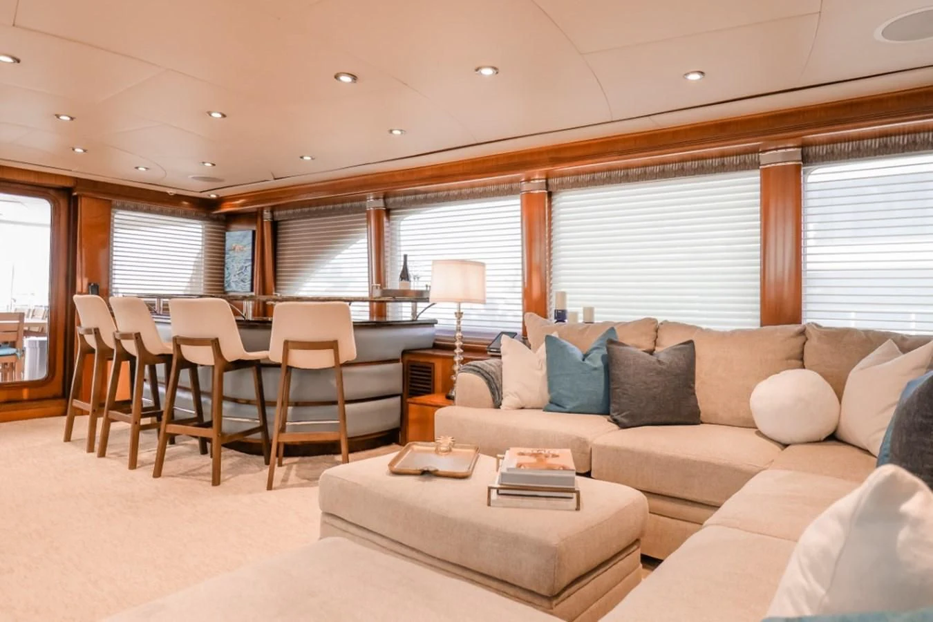 a living room with a couch and a table aboard JUST ENOUGH Yacht for Charter