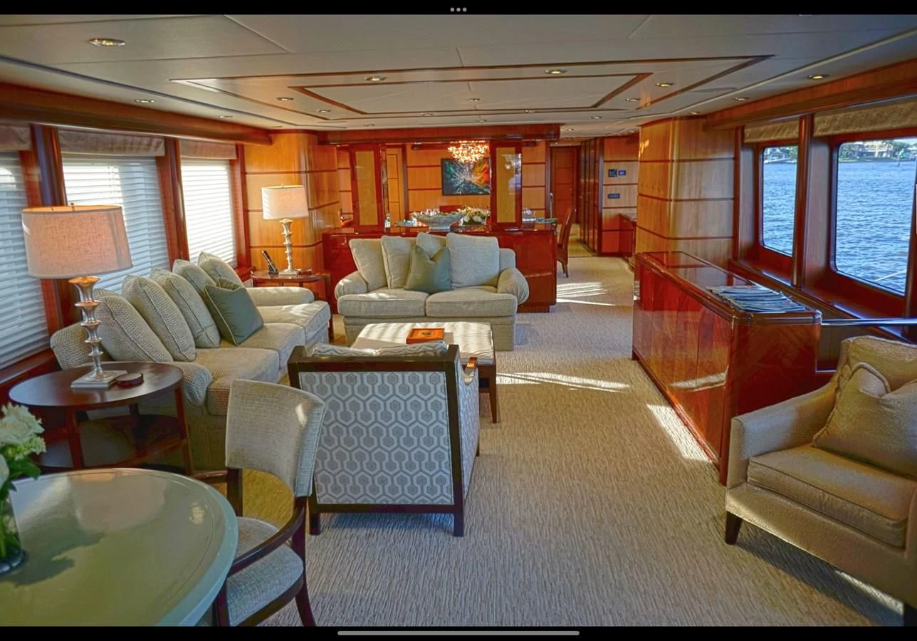 a train car with a large living room aboard JUST ENOUGH Yacht for Charter
