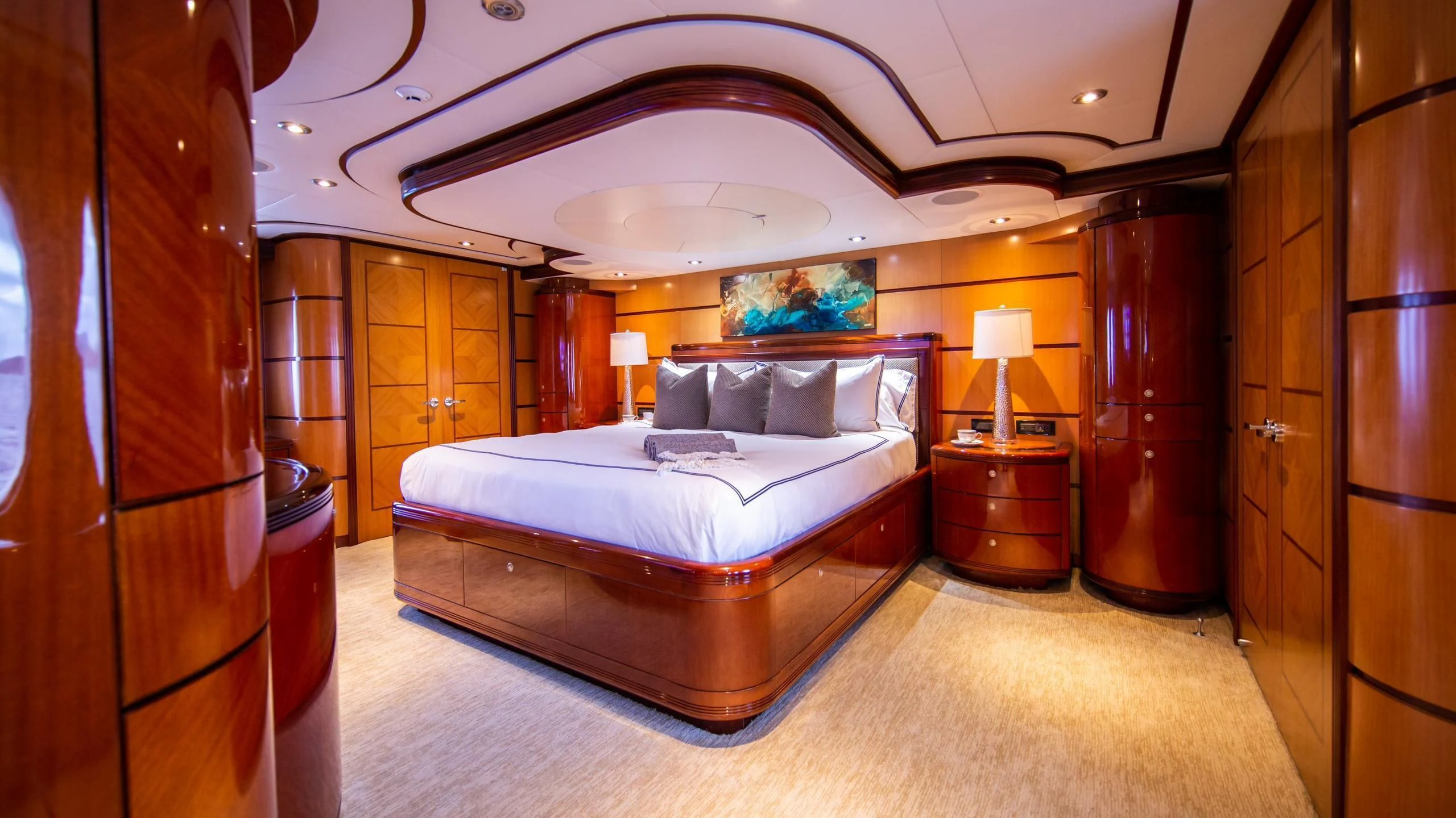 a bedroom with a large bed aboard JUST ENOUGH Yacht for Charter