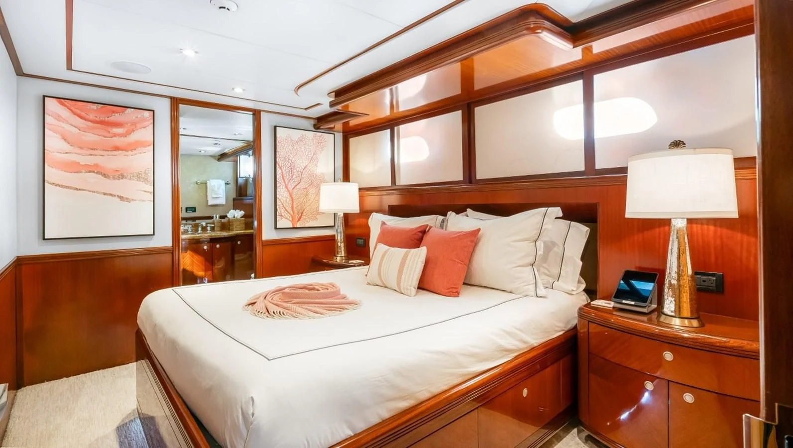 a bedroom with a large bed aboard JUST ENOUGH Yacht for Charter