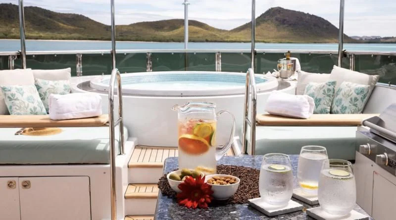 a table with drinks on it aboard JUST ENOUGH Yacht for Charter